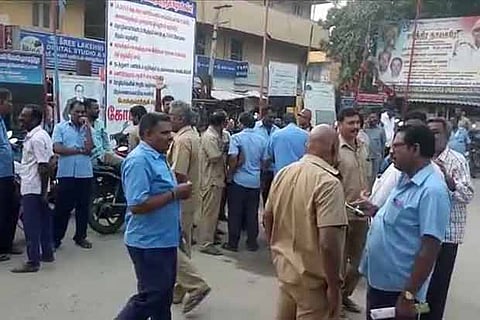 Transport workers participate in the protest at Iyappanthangal depot in Chennai held on Friday