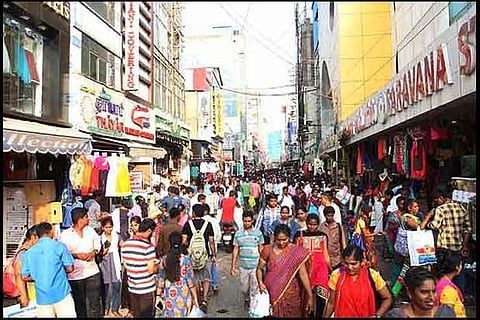 Shoppers sneak through congested Ranganathan Street