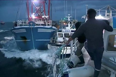 French and British fishing boats collide during scrap in English Channel over scallop fishing rights