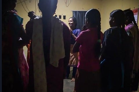 Teenagers working in spinning mills participate in an awareness programme in Kurumpatti, Dharmapuri