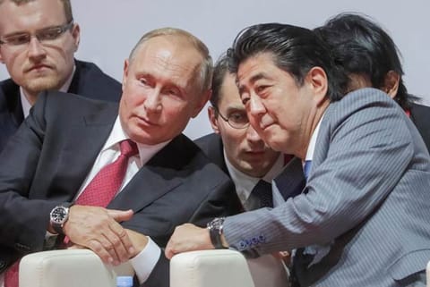 Russian President Vladimir Putin and Japanese Prime Minister Shinzo Abe