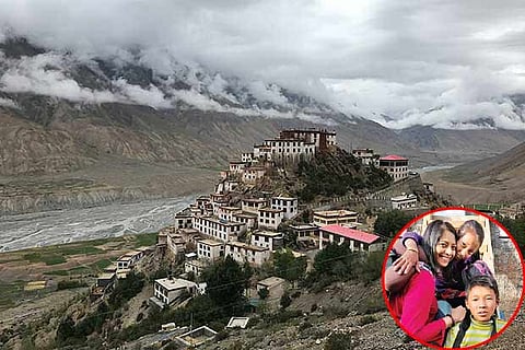 Inset: Preethika with the local children,