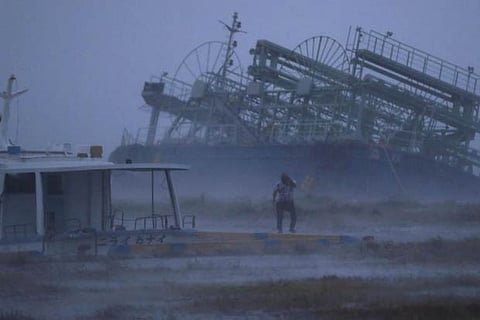 A ship is washed ashore by Typhoon Trami at a port in Yonabaru, on the island of Okinawa, Japan