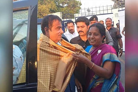 Union road transport minister Nitin Gadkari is welcomed by a party functionary in Salem on Sunday