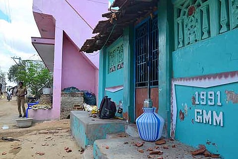 Houses damaged in the a clash at Thennavanur