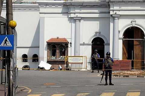 Security personnel stand guard near St Anthony's Shrine in Colombo