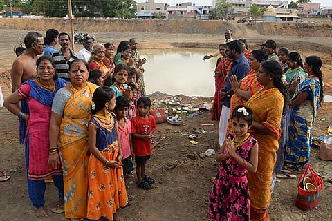 Locals perform Aadi Perukku rituals at the  Azhagi Kulam on Saturday