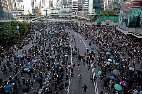 Demonstrators gather as Hong Kong police fire tear gas. File photo: Reuters