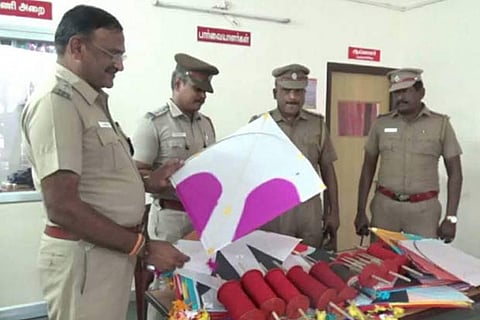 The police seized nearly 300 kites and several bundles of manja threads from the house