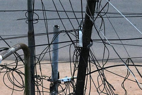 Wires tied to a pole at Old Washermenpet