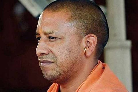 Yogi allots portfolios, downgrades some Ministers