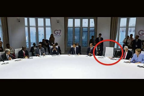 One empty chair at G-7 climate meeting, Trump's