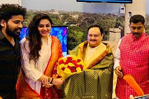 BJP working president JP Nadda welcoming Namitha into the party fold in Chennai on Saturday