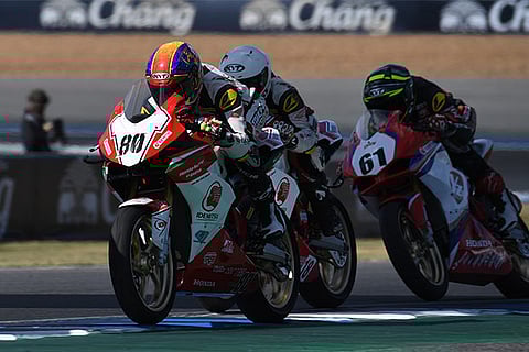 Honda Racing India?s Rajiv Sethu (80) battles for lead in AP 250 race