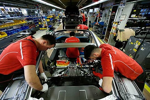 Japan factory activity shrinks in November as export slump deepens - PMI