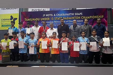 The winners and runners-up of the U-15 Badminton Championships pose for a photo