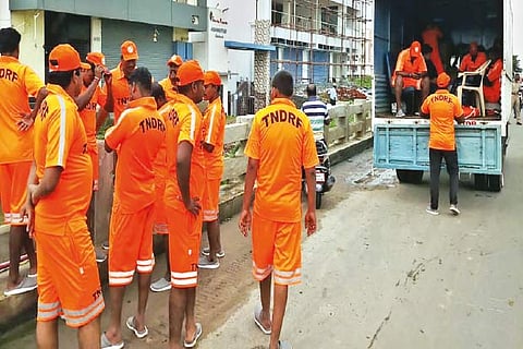 TNDRF teams at work in Mudichur on Monday