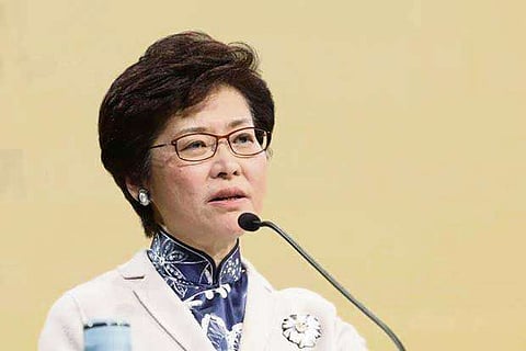 HK's Carrie Lam closes ranks with China, condemns US law
