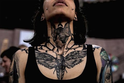 Malay Minister slams 'obscene, half naked' tattoo show