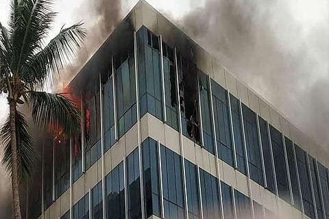 Security guards noticed smoke emanating from the fourth floor and alerted the fire rescue personnel