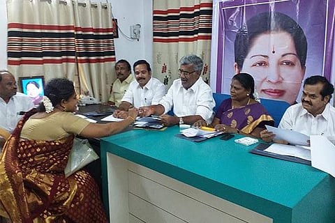 One of the AIADMK aspirants submits application at the party district office in Tiruchy on Saturday