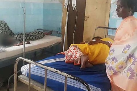 The woman and her children undergoing treatment at Coimbatore Medical College and Hospital (CMCH) on Thursday