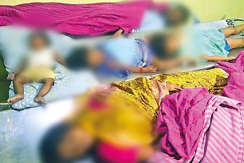 Bodies of M Arun, his wife and three children kept at the government hospital after an autopsy on Friday
