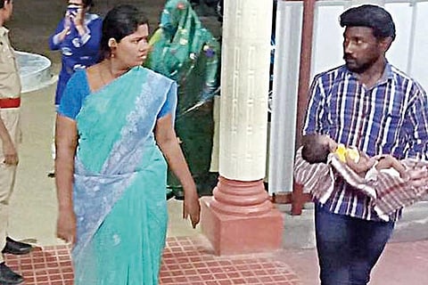 The parents of the baby being taken for interrogation in Coimbatore on Wednesday