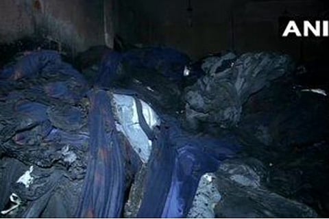 At least nine people were killed in a fire incident in a godown in outer Delhi