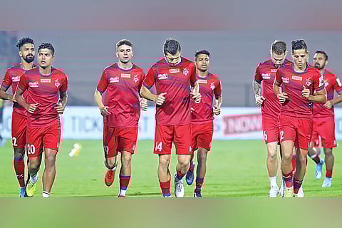 ATK players go through their drills in a training session on the eve of their match against Bengaluru FC in IS