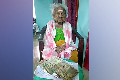 Kamalammal with her savings in demonetised currency