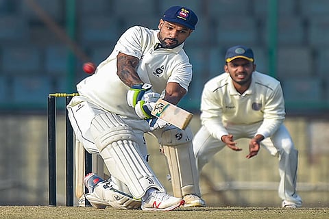 Delhi captain Shikhar Dhawan plays a shot against Hyderabad