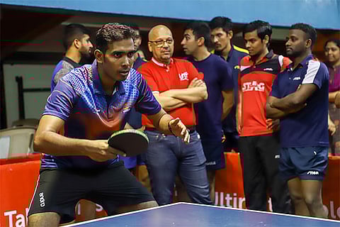 Sharath Kamal (left) practises at the camp in Chennai as former player Kamlesh Mehta looks on