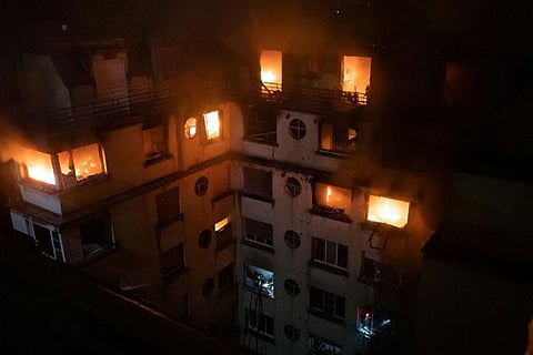 Ten dead in possible arson attack at Paris apartment block