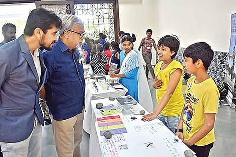 Students display prototypes for sustainable processes