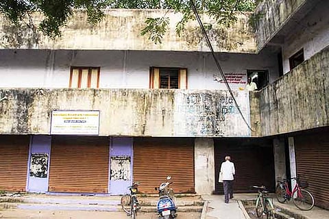 The library, located on the first floor of the building, cries for attention