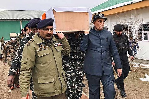Home Minister Rajnath Singh, Jammu-Kashmir DGP Dilbag Singh shoulder a coffin of a slain CRPF jawan