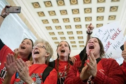 Striking teachers at the Capitol building in Charleston, West Virginia, US