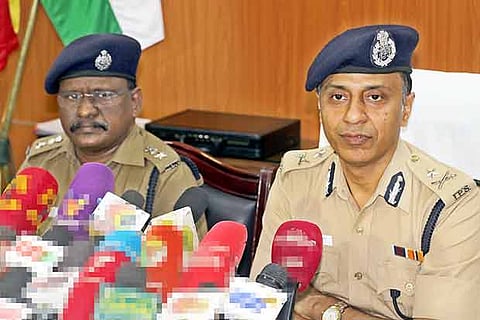 Police Commissioner Sumit Saran explaning how the case was resolved, in Coimbatore on Thursday