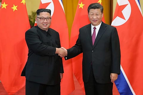 Kim Jong-un visits China for talks, Beijing denies using him as bargaining chip with US