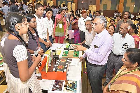 IIT-M prof M Sunder Krishnan interacts with a participant during the contest at VIT university on Saturday