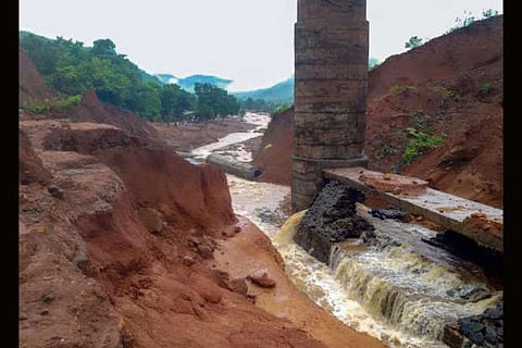 A view of the Tiware dam which breached following incessant rains, in Ratnagiri.