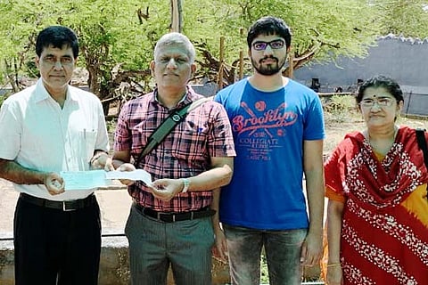 Kannan Parthasarathy (2nd from left) and his wife Alamelu Rohini with their son at the zoo