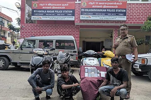 Surya, Kumar and  Lakshmanan with the seized goods on Sunday