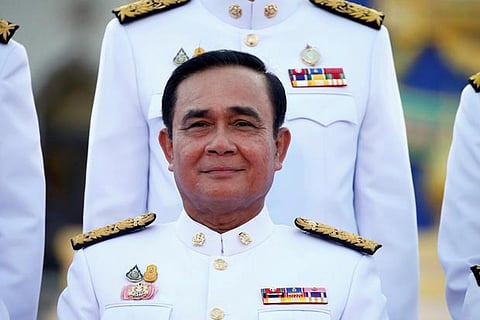 Thailand's Prime Minister Prayuth Chan-ocha poses for a photo with the new government cabinet