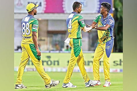 Kovai Kings bowler T Natarajan (centre) is congratulated by his team-mates