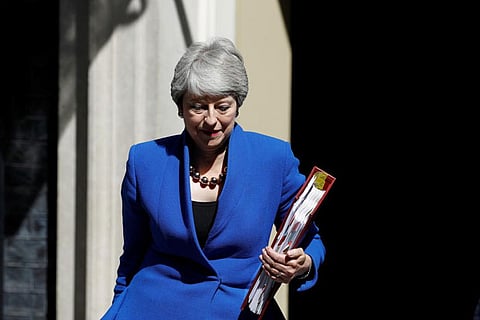 Theresa May bows out as UK PM amid applause
