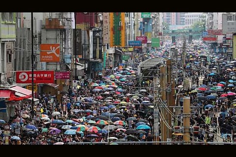 Hong Kongers defy police ban with mass 'anti-triad' rally