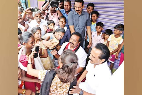 DMK president interacting with residents who clicked selfies with him in Vaniyambadi while campaigning