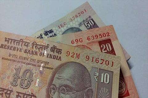 Rupee slips 6 paise to 68.95 vs USD in early trade